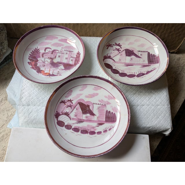 This set of two cups and saucers, with three matching dessert plates, is especially elegant, featuring the rare "House"...