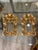 A pair of handcrafted rectangular frames made of carved, gilded wood, reminiscent of the italian baroque style or the...