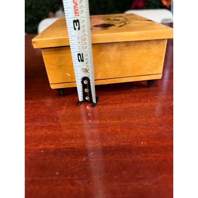 Up for consideration is a beautiful vintage small wooden jewelry box with floral accents. This would look lovely in your...