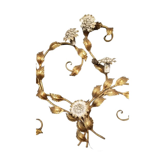 Mid-century era Tole wall sculpture light up wall sconce in the form of curling vines in brass enameled white illuminated...