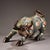 This striking vintage statue depicts a powerful ox, the second animal in the Chinese zodiac, cast in a dynamic, charging...