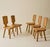 A set of six chairs, model “S28,” designed by Pierre Chapo in 1972 and crafted in solid elm. Each chair is distinguished...