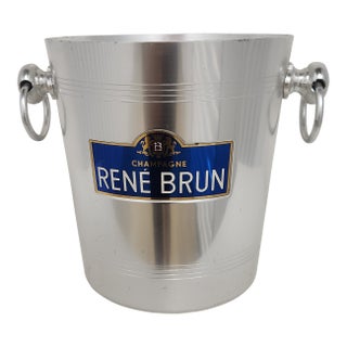 Mid-Century French René Brun Champagne Aluminum Ice Bucket – Brushed Silver Metal With Blue Label & Ring Handles For Sale