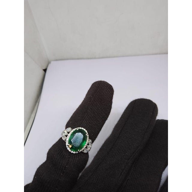Gemstone details Gold Purity: 18K Solid Gold Emerald: 3.35 cts Diamond: 0.80 cts 18K gold Gross weight: grams Net weight:...