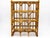 This vintage Hollywood Regency tortoise bamboo rattan wine rack is a charming and practical addition to any home. It...