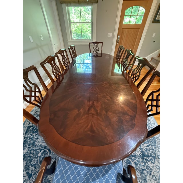 A breathtaking Chippendale by Drexel mahogany dining set in exceptional condition. Manufacturer authenticated by original...