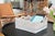 Keeping organized creates structure and allows you to work more efficiently. Our Scallop Collection rattan shelf and...