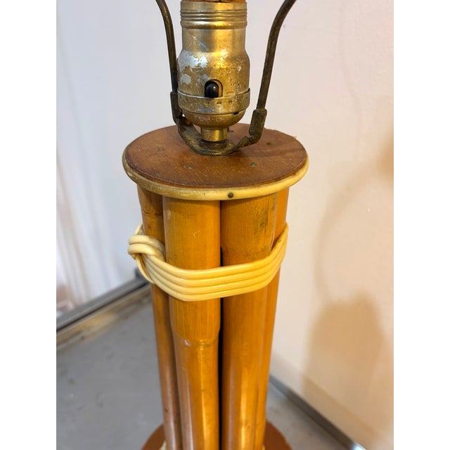 1960s Russel Wright style bamboo table lamp. Excellent condition. Measurements 26.5" tall including harp & finial 19" tall...