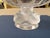 This clear, fluted crystal bowl resting on a pedestal formed by four frosted glass sparrows is accompanied by two...
