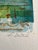 A vibrant and highly graphic mid-century modern serigraph titled “Bird Market,” signed lower right by Lynn Dutil and...