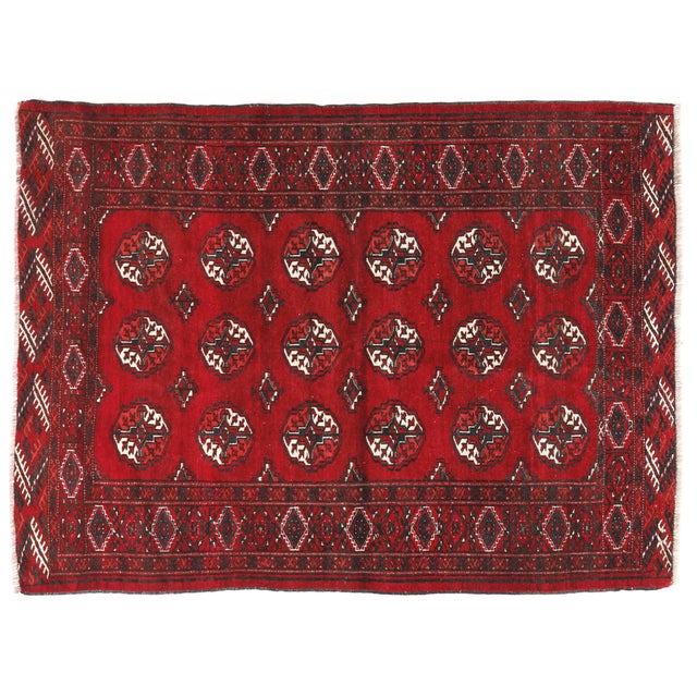 Mid-Century Turkmen Yomut Rug with Repeating Guls, Hand-Knotted Wool, Circa 1950s This authentic mid-20th-century Turkmen...