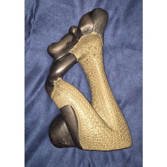 Elevate your shelving or gallery display with this striking, vintage abstract figurative sculpture. Crafted with a...