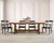 A substantial rustic country French Provincial style oak trestle dining table, crafted with a thick rectangular plank top...