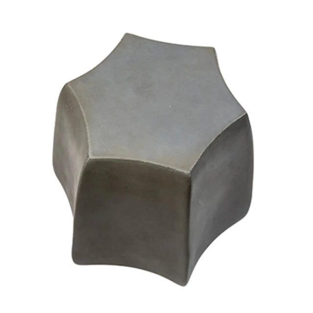 Outdoor lightweight concrete side table with natural tone finish. Attractive shape and design. Each has variations in...