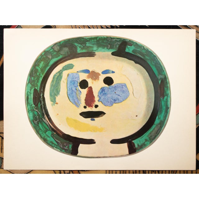 A stunning set of 8 vintage prints (based on photography, not actual ceramic pieces) of Pablo Picasso's Ceramic Platters....