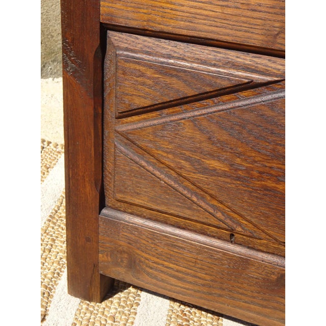 A charming armchair with a salt chest, crafted entirely from solid wood and fully pegged. The backrest is carved with a...