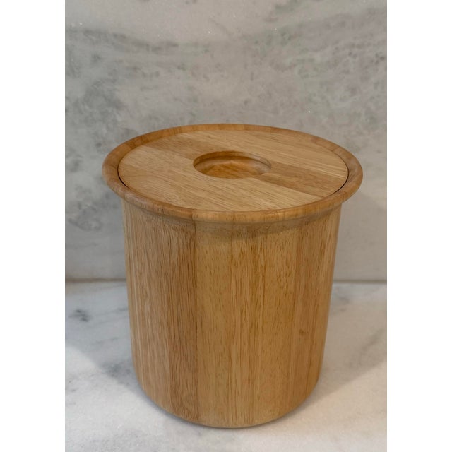 Vintage blonde or light wood ice bucket with lid and plastic liner.