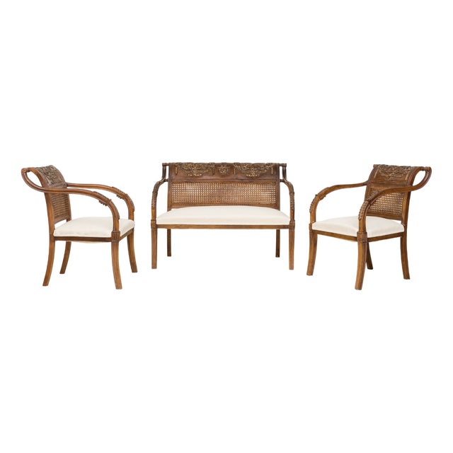 Louis XVI Style Carved Chestnut and Caned Settee with Armchairs, Early 20th Century, Set of 3 For Sale