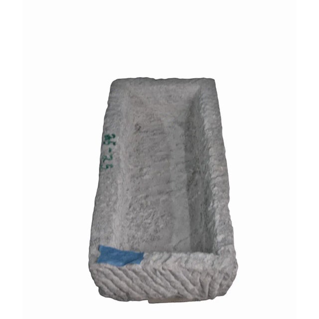 This stone trough is hand carved out one piece of stone and hand chiseled by the locals. This hand made stone planter is...