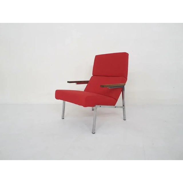 Metal frame and wenge arm rests. With new red upholstery. In good condition. Martin visser martin visser was one of the...