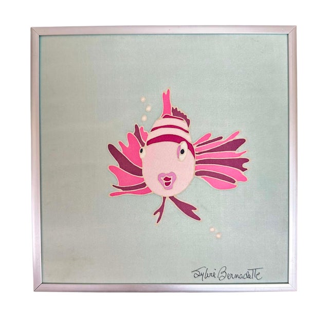 A delightful pair of original silk paintings by Canadian artist Sylvie Bernadette, featuring whimsical tropical fish in...