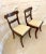 Pair of quality antique Regency carved mahogany side chairs having a quality shaped carved mahogany top rail and centre...