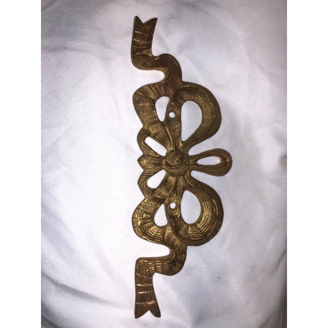 Darling ribbon bowed brass wall decor. Found at an estate in SW FL.