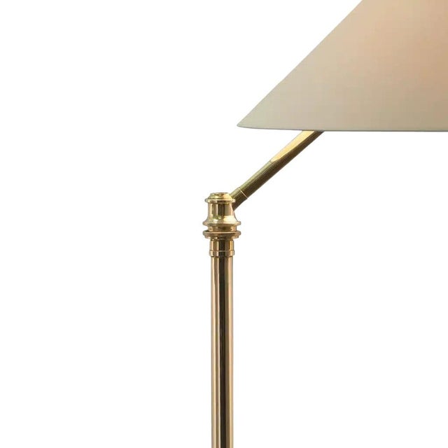 A refined pair of original Peyton floor lamps by Charles Edwards (England), handcrafted in solid brass and finished in a...