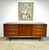 A gorgeous mid century Danish modern credenza / long dresser designed by Svend Aage Madsen for Falster a Mobelfabrik,...