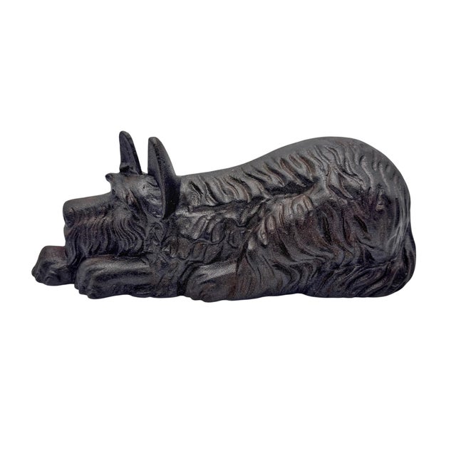 Cast Iron Sleeping Scotty Dog Doorstop, Attributed to Hubley Manufacturing Company, Early 20th Century This charming cast...