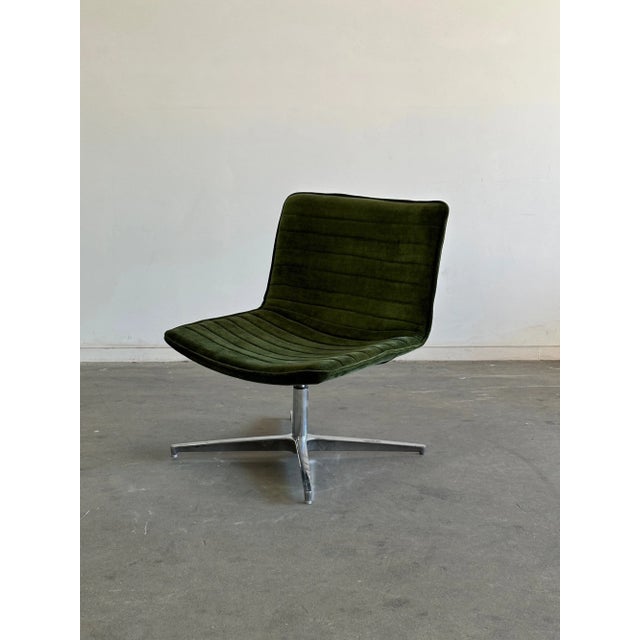 W27.5 D26 H31.5 SW26 SD19 SH17 Newly Upholstered swivel lounge chair with fun channel stitching and chrome polished bases....