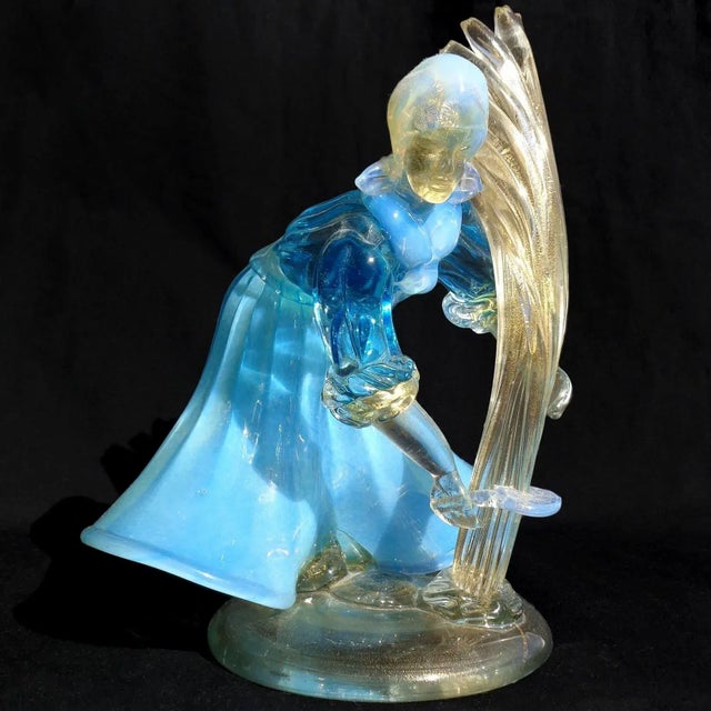 Beautiful vintage Murano hand blown opalescent blue and white, with gold flecks Italian art glass working farmer woman...
