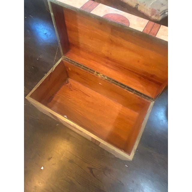 Beautiful tessellated marble and brass coffer with turned bun feet.