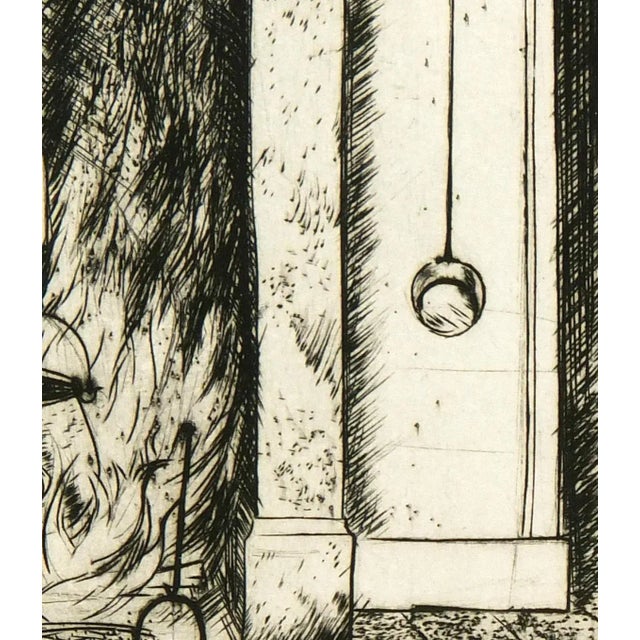 Vintage French fine art etching print of a large fireplace and antique utensils by artist M. Portal, circa 1960. Displayed...