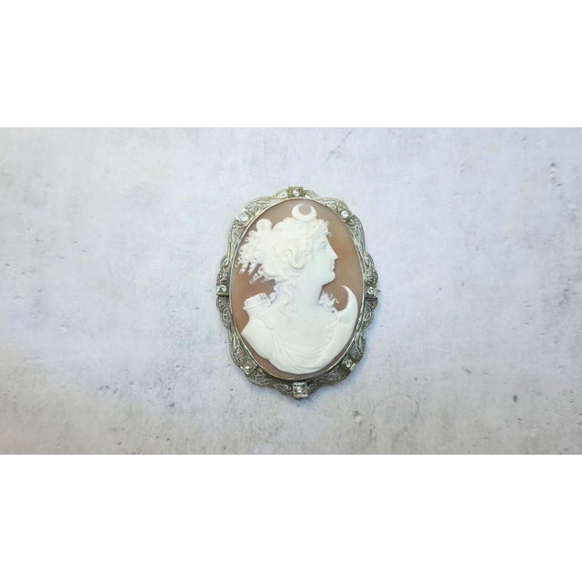 We are pleased to present an important antique shell cameo portraying the goddess Artemis (Diana in Roman mythology),...
