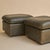 A 1970s Swiss model DS 49 leather ottoman by De Sede. Upholstered in a rich olive green leather, the generously padded,...