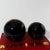 Vintage ceramic spheres featuring a lustrous black glaze with striking gold marbling throughout. The set includes one...