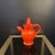 Charming glazed red/orange ceramic water pitcher, signed PR on the reverse for Pierre Rinaudo (1930-2005), a ceramist from...