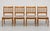 Set of four Danish Mid Century Modern dining chairs, c. 1960’s featuring warm solid teak frames with gently curved backs...