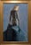 This artwork depicts a figure draped in a flowing fabric, exuding an air of confidence and poise. The intricate floral...
