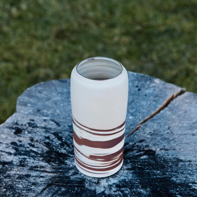 Marbled stoneware vase, wheel-thrown from white and red stoneware and coated with "Crystal Clear" glaze inside and...