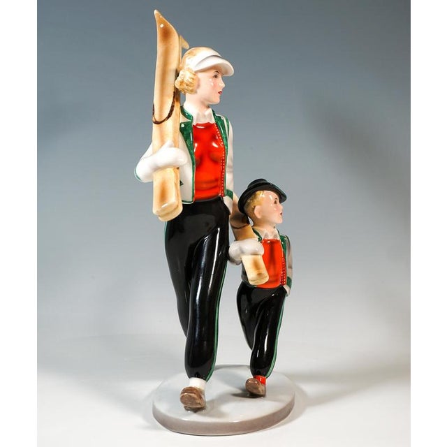 Rare goldscheider vienna figurine group of the 1930s. Two figures walking side by side, mother and child with skis on...