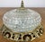 A charming Vintage French ceiling lamp featuring an elegant cut glass shade with geometric detailing and an ornate...