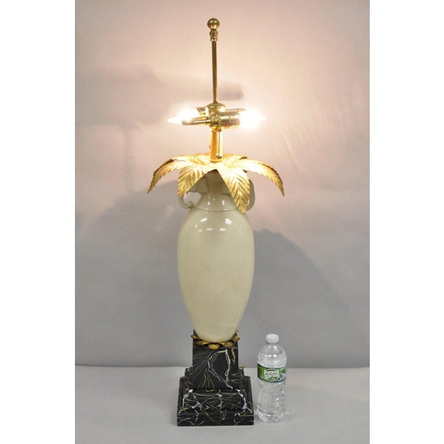 Frederick Cooper Hollywood Regency Porcelain Elephant Safari Palm Tree Table Lamp on Painted Metal Base. Circa Late 20th...