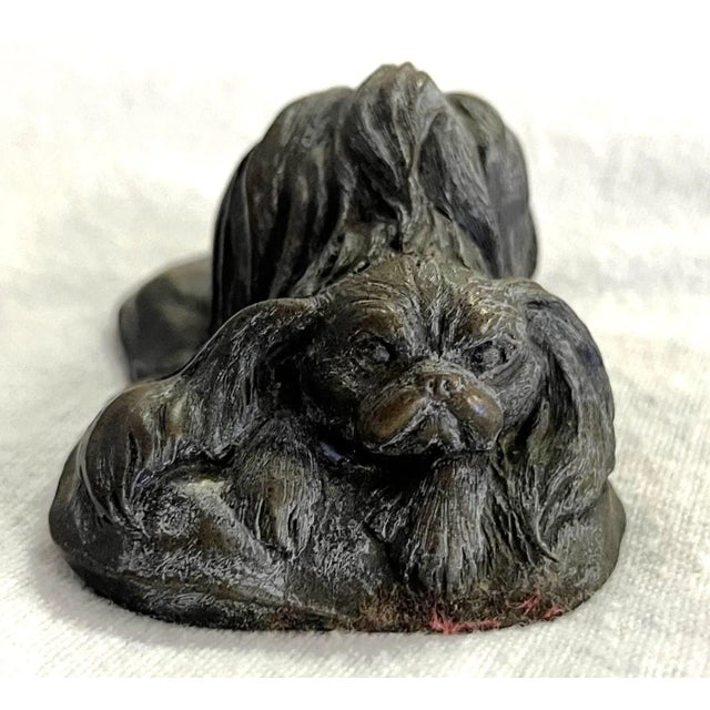 Great little vintage signed bronze chin dog sculpture. It's completed in the Japanese Okimono style with incredible detail...