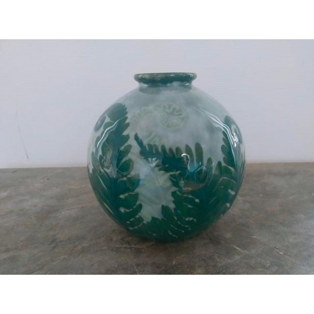 Magnificent vase by Camille Tharaud (1878-1956) in Limoges porcelain depicting ferns. Very beautiful deep glaze in shades...