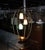 Very nice Mid-Century Modern brass "cage" table lamps with colored glass shades.