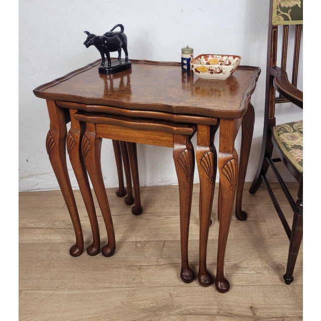 This nest of tables boasts a wonderful features that are sure to impress in a period styled living or dining room setting....