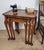 This nest of tables boasts a wonderful features that are sure to impress in a period styled living or dining room setting....