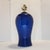Add a striking pop if color to your space with this vintage mid-century modern ceramic table lamp. The lamp features a...